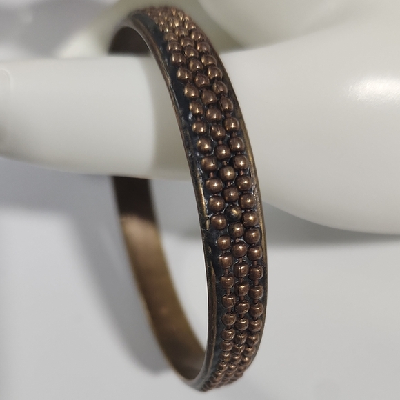 Elegant Vintage Filigree Bronze Bangle Cuff Bracelet with Textured Design.
